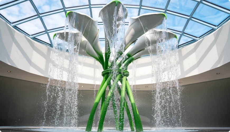 Water art installation under a Suntago's glass roof